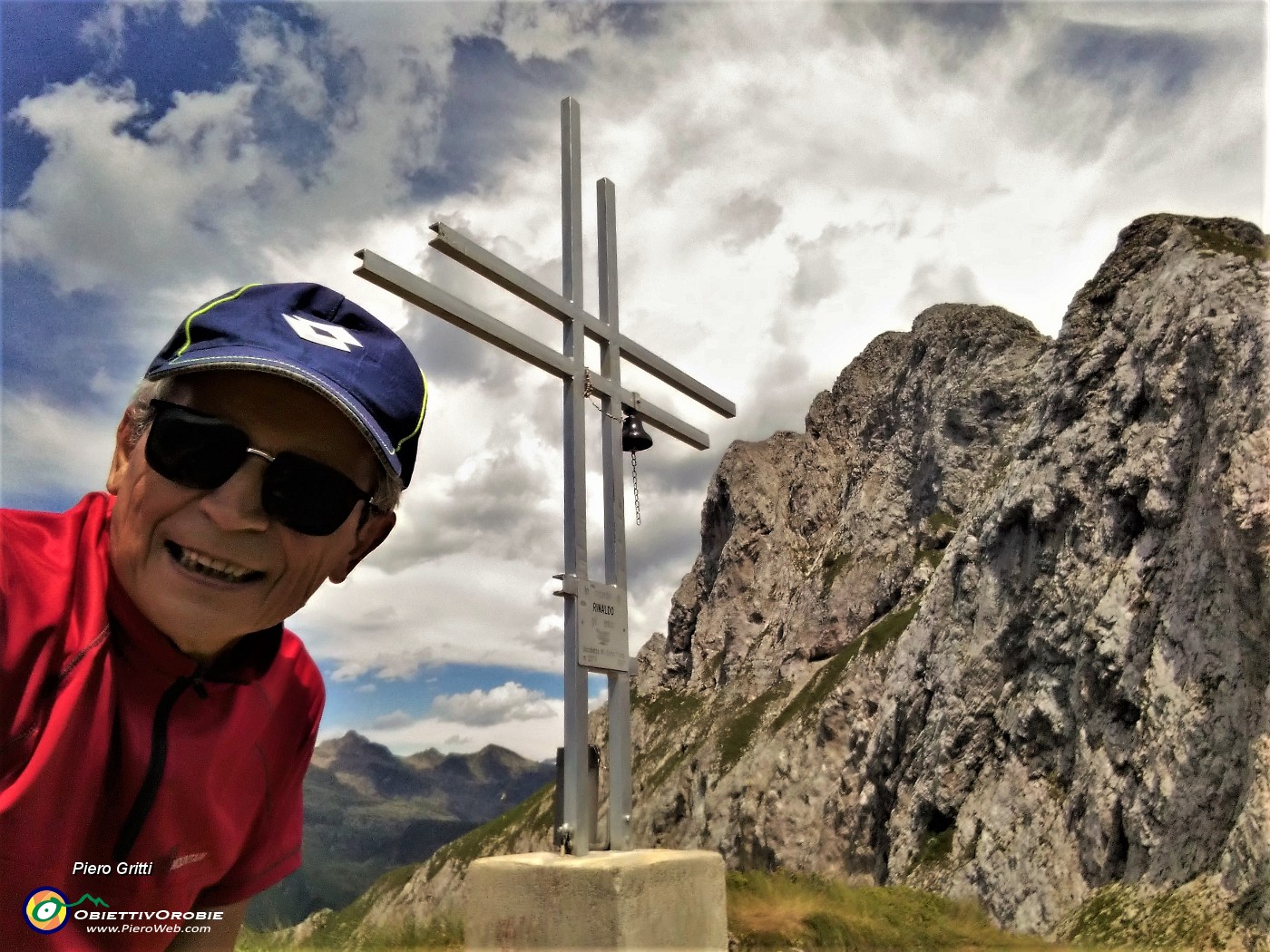 66 Alla croce della Bocchetta di Corna Piana (2078 m).jpg